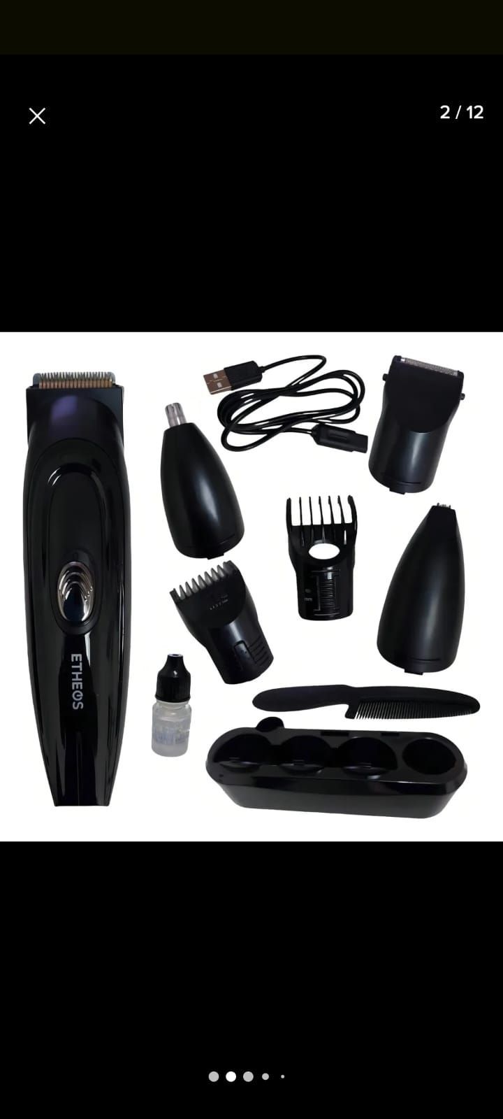 Kit de cortapelos eléctrico negro con múltiples accesorios, peines, cargador, botella de aceite y estuche de almacenamiento sobre fondo blanco.