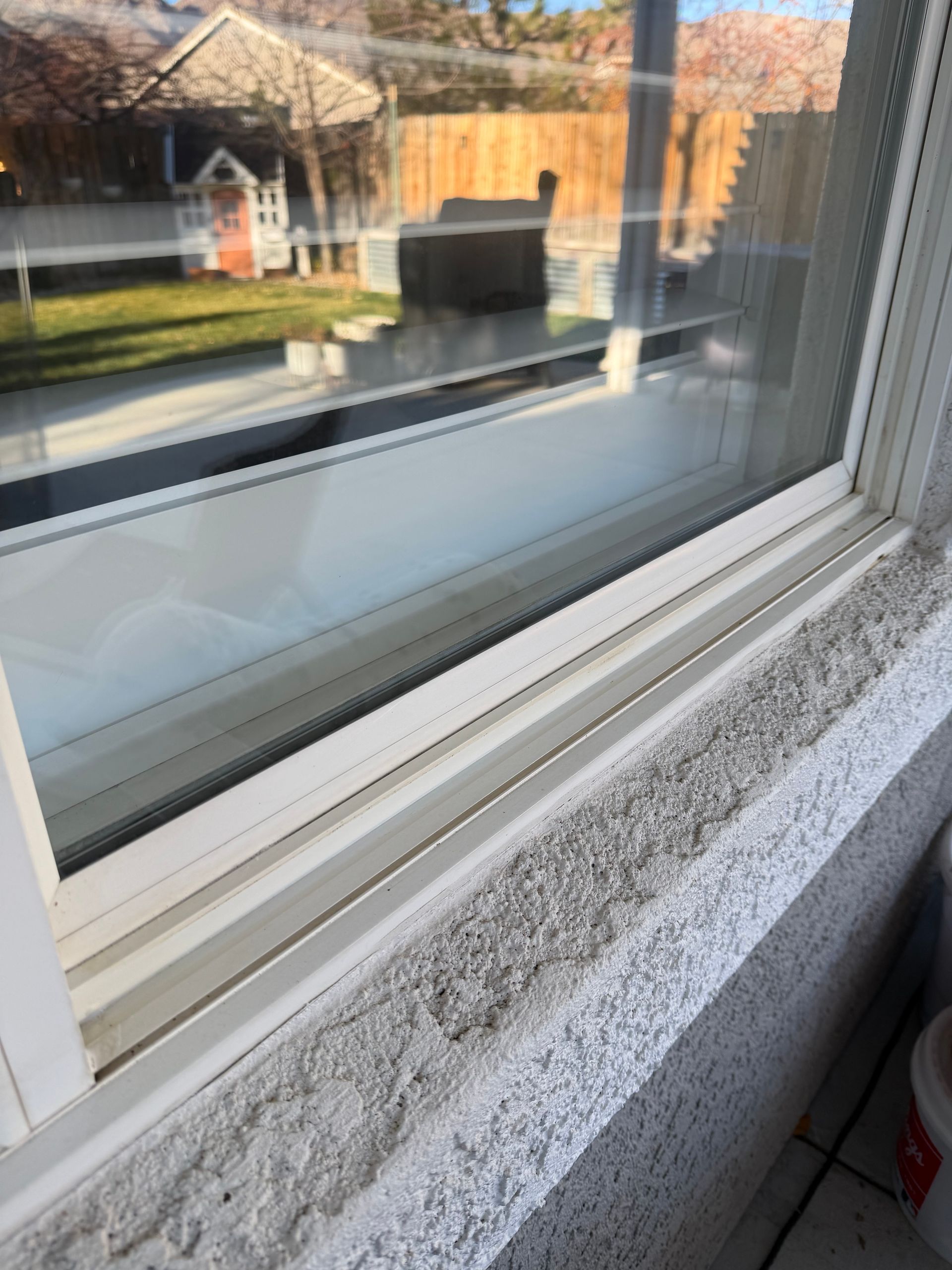 Screen and track cleaning service by Wolf City Window Cleaning