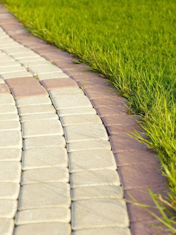 Brick paving pathway with clean joints in a Darwin garden