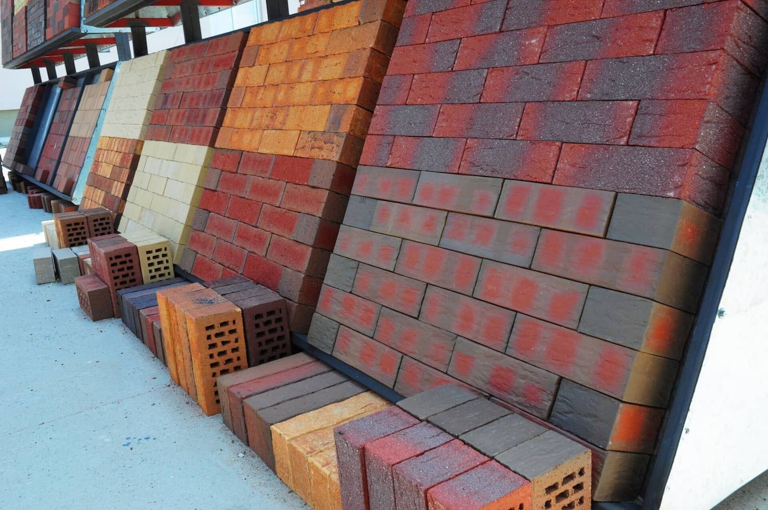 A Row of Bricks of Different Colours Are Stacked on Top of Each Other — The Brick Paving Centre in Winnellie, NT