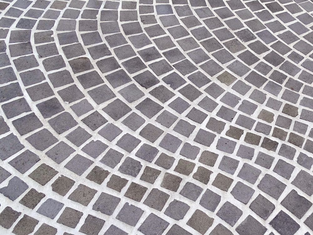 A Close Up of a Circular Pattern of Bricks on a Sidewalk — The Brick Paving Centre in Winnellie, NT