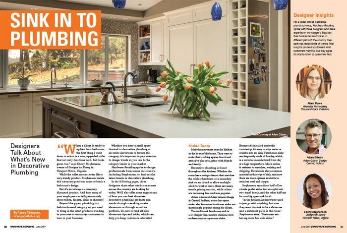 Modern kitchen with island and flowers, overlaid with “SINK IN TO PLUMBING” magazine-style text.