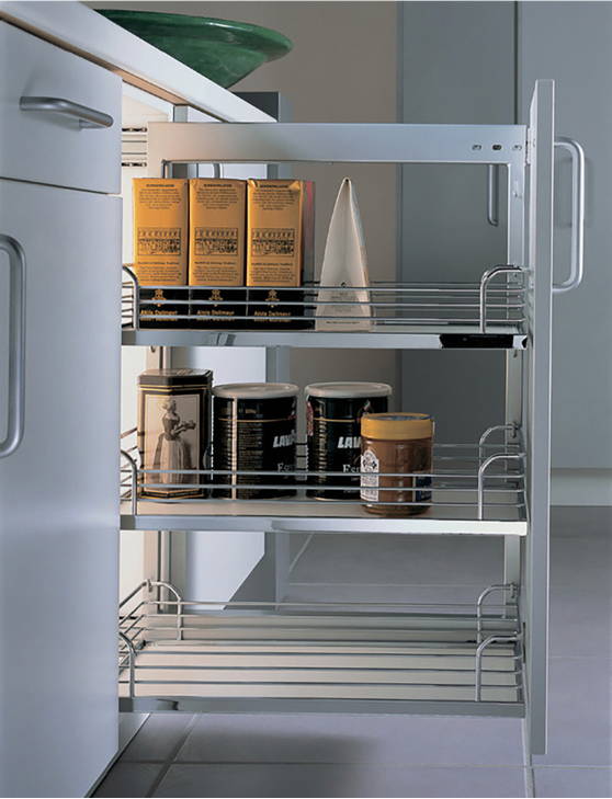 Pull-out pantry shelves with jars and cans in a kitchen cabinet