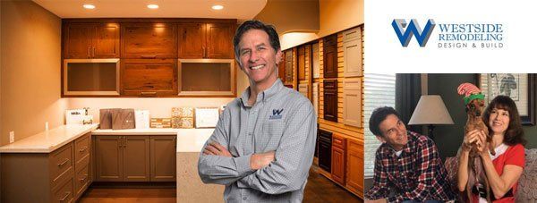Kitchen showroom with two smiling people beside a Westwood logo and a cabinet interior display