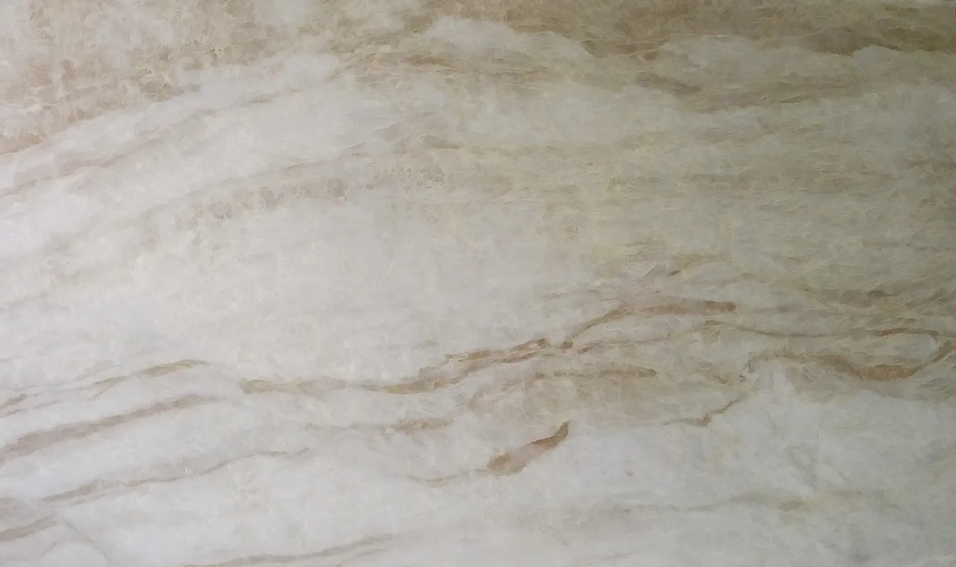 A close up of a piece of paper with a marble texture.
