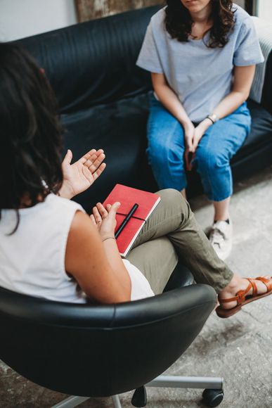 Therapist talking with a patient during a counseling session