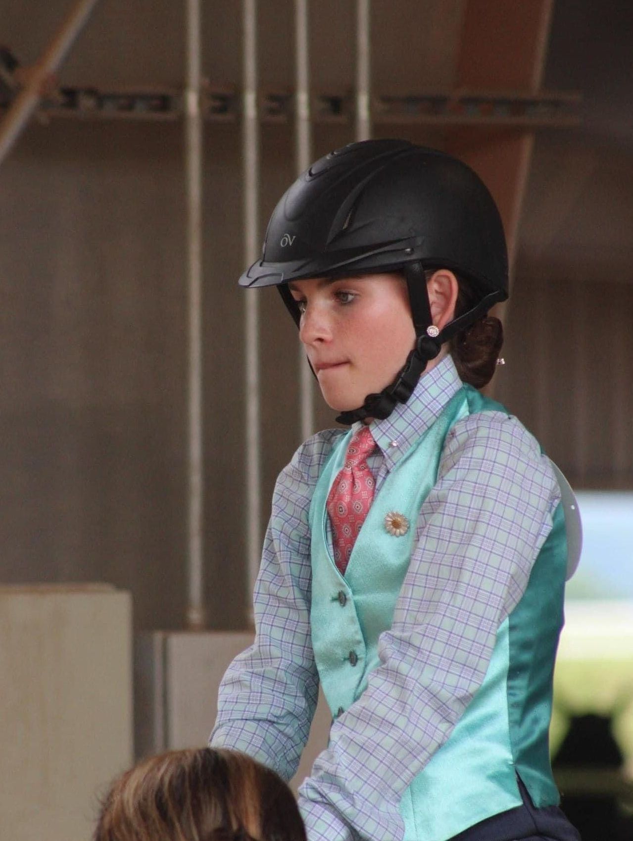 photo of Lenux Stables academy rider heading toward stalls following horse show competition