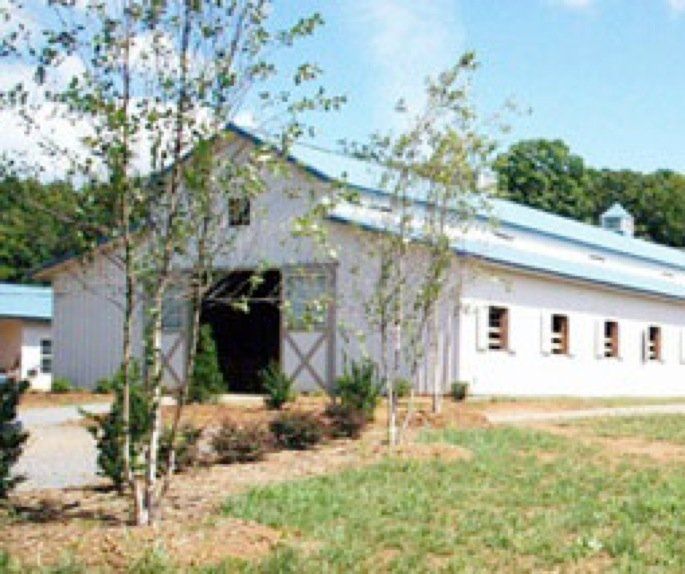 photo of outside Lenux Stables main barn