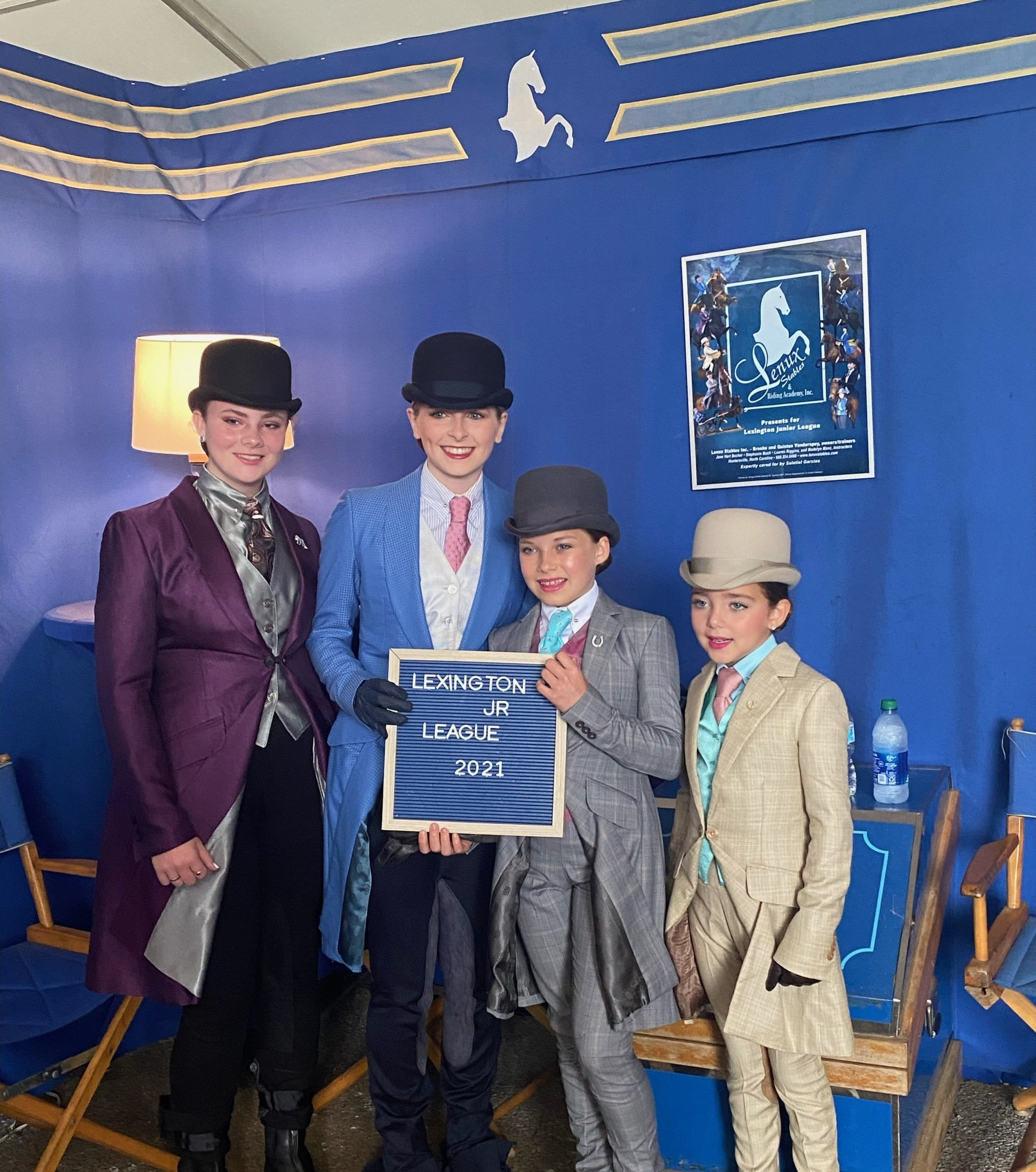 photo of four Lenux Stables performance riders displaying