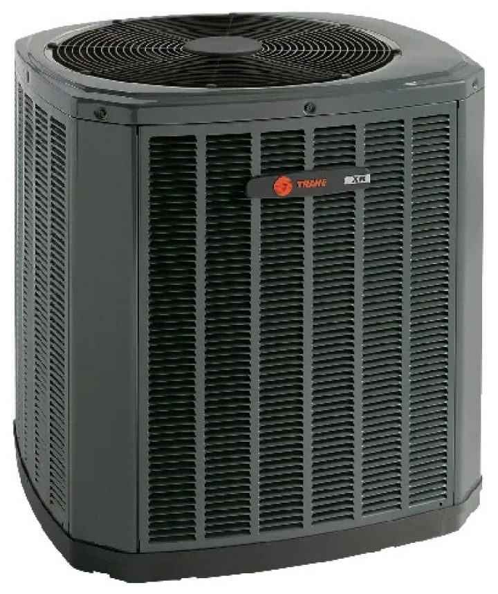 Gray outdoor air conditioner unit with a top fan and front grille