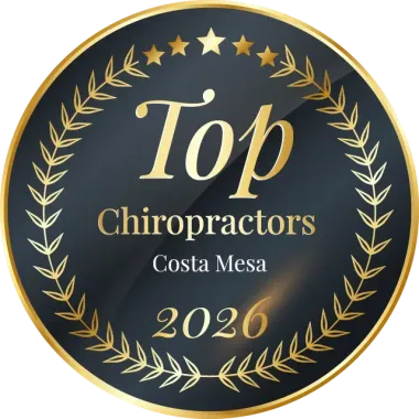 Gold-and-black badge reading “Top Chiropractors, Costa Mesa, 2020” with laurel wreath border