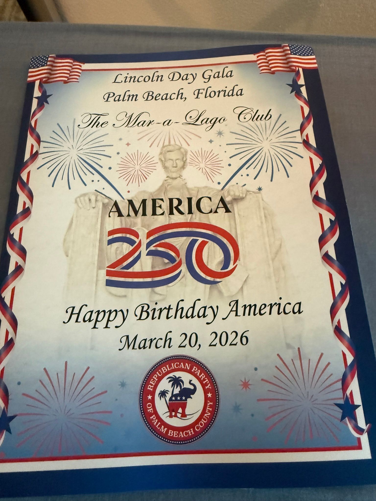 Patriotic 250th birthday card with fireworks, U.S. flags, and “America 250” text, dated March 2026