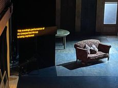 Hanging caption unit at theatre displaying text. Hanging caption unit at theatre displaying text.
