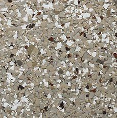 Concrete floor coating with beige, white, and brown chips.