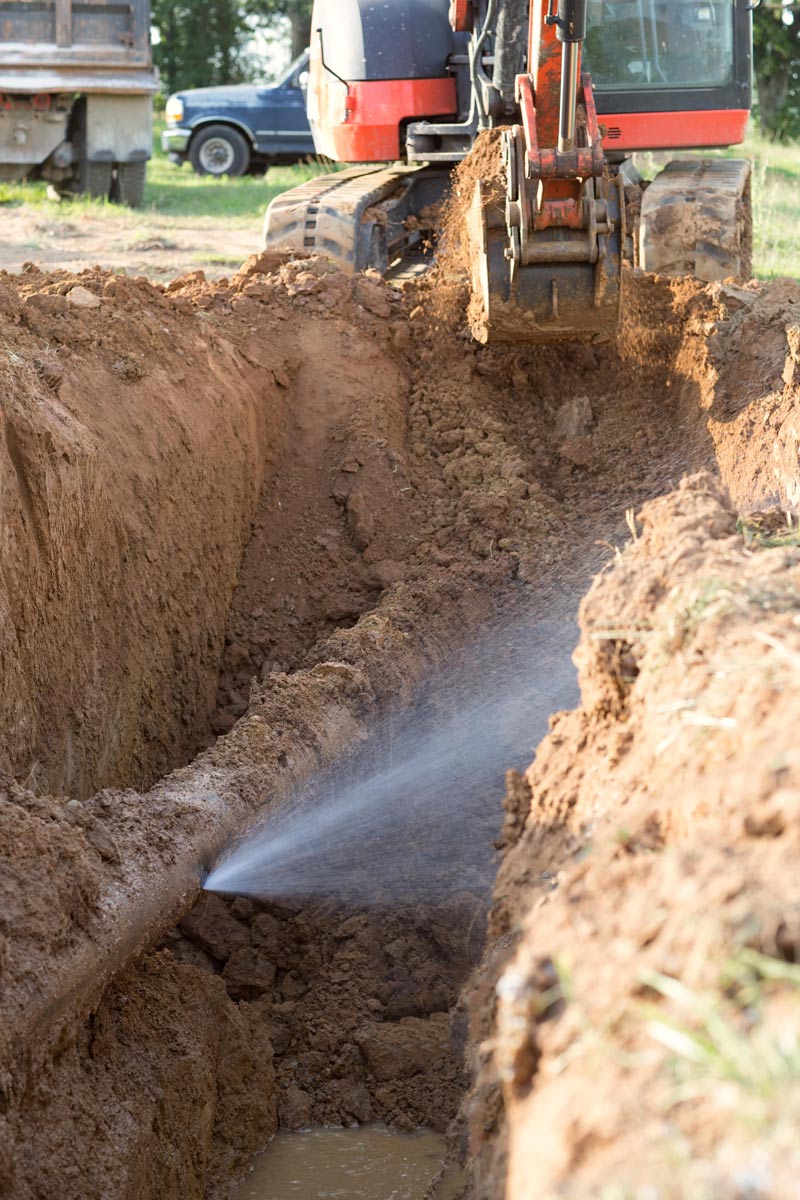 Spraying Water And The Pipe — Dempsey Plumbing in Narara