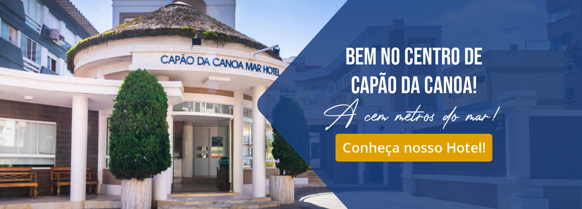 A hotel with a sign that says bem no centro de capão da canoa !