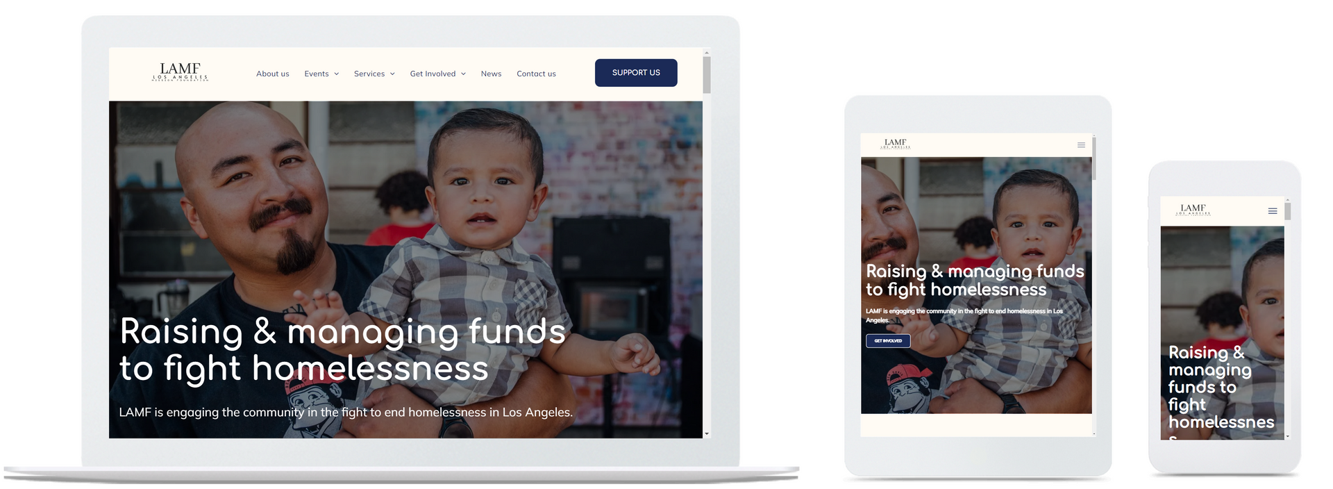 A man is holding a baby on a tablet , phone , and laptop.