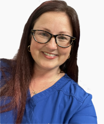 Woman wearing glasses smiling in a blue top.