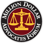 Million Dollar Advocates Forum logo with gold scales on a black circular seal and red background