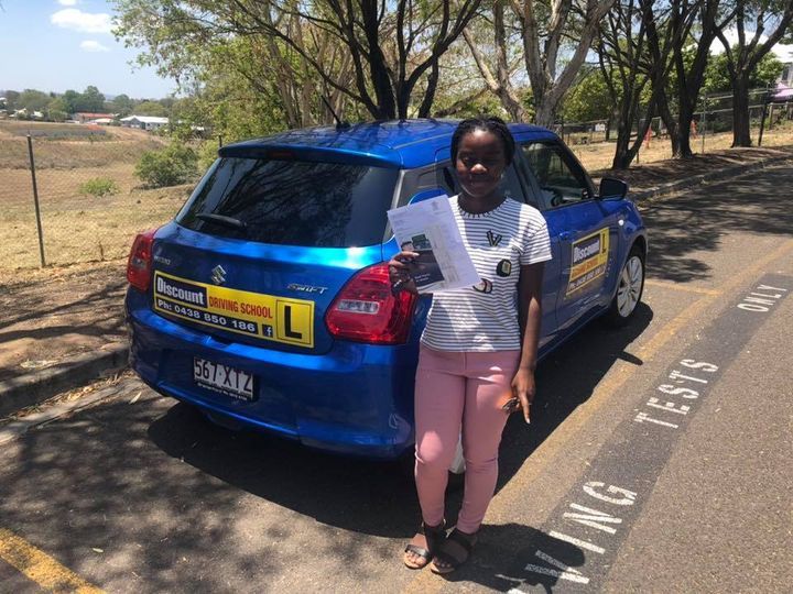 Student Driver Wearing A Tshirt Stripes — Driving Lessons In Springfield Lakes, QLD