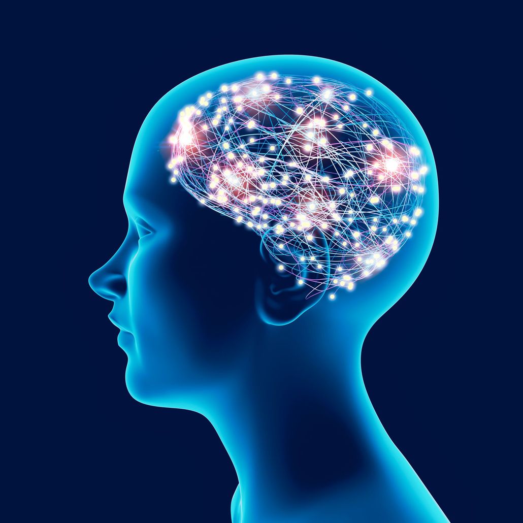 Blue silhouette of a human head with glowing neural connections in the brain area