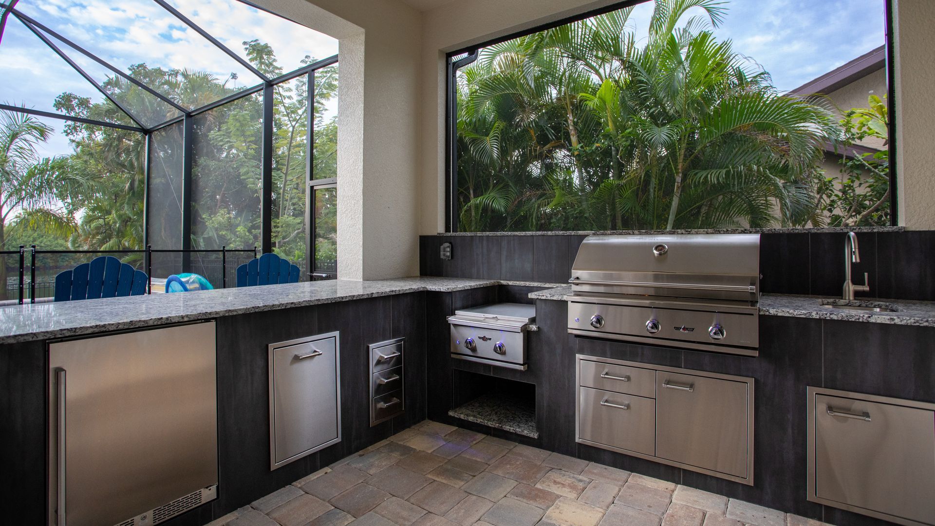 Large L Shape Outdoor Kitchen, Granite countertop, Twin Eagles Grill, Delta Heat Inserts, Fridge, Storage Fort Myers FL