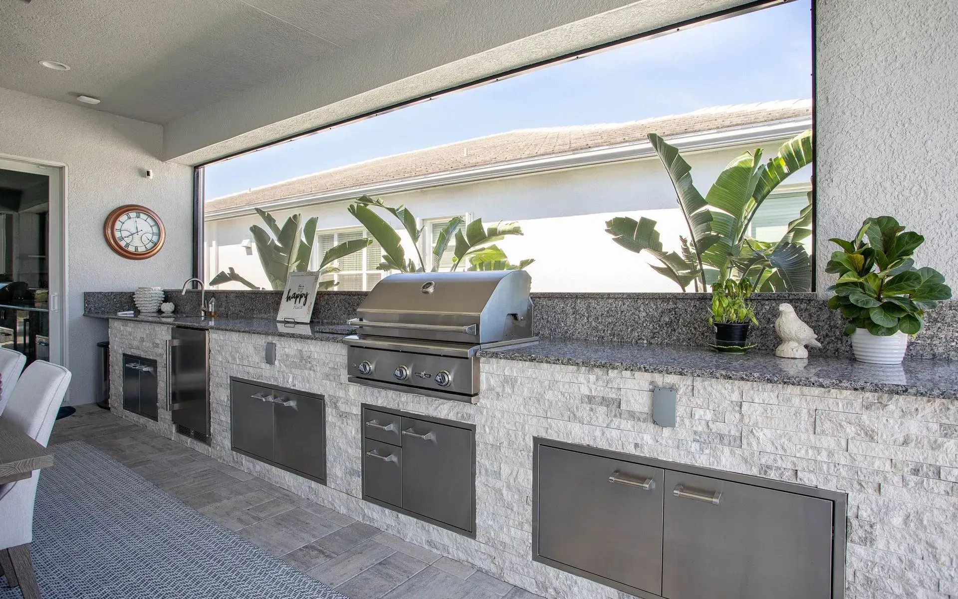 Straight run outdoor kitchen with talya gray stone naples, fl