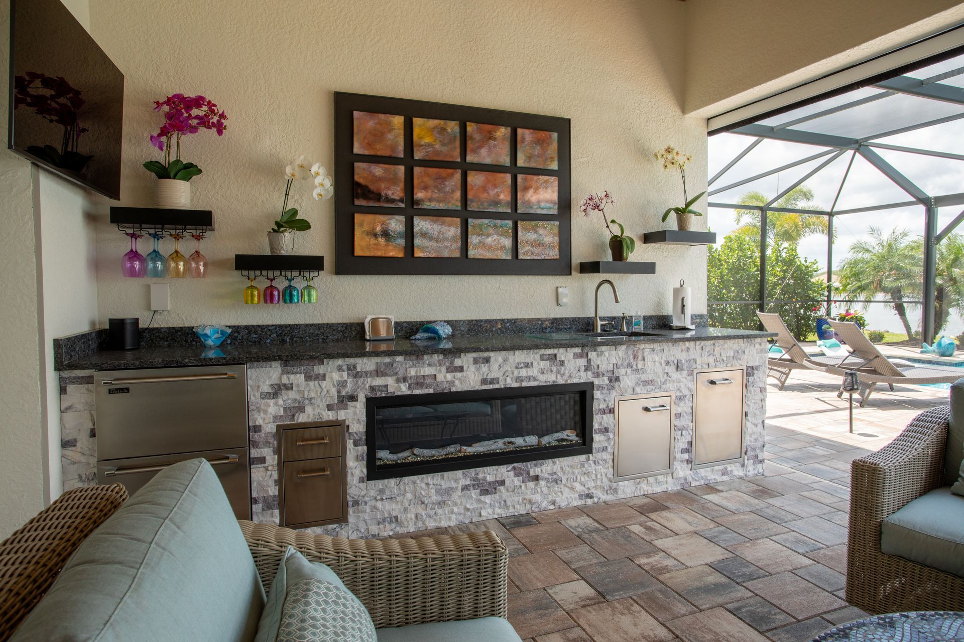 Custom Outdoor Kitchen Fireplace Stacked Stone Estero, FL