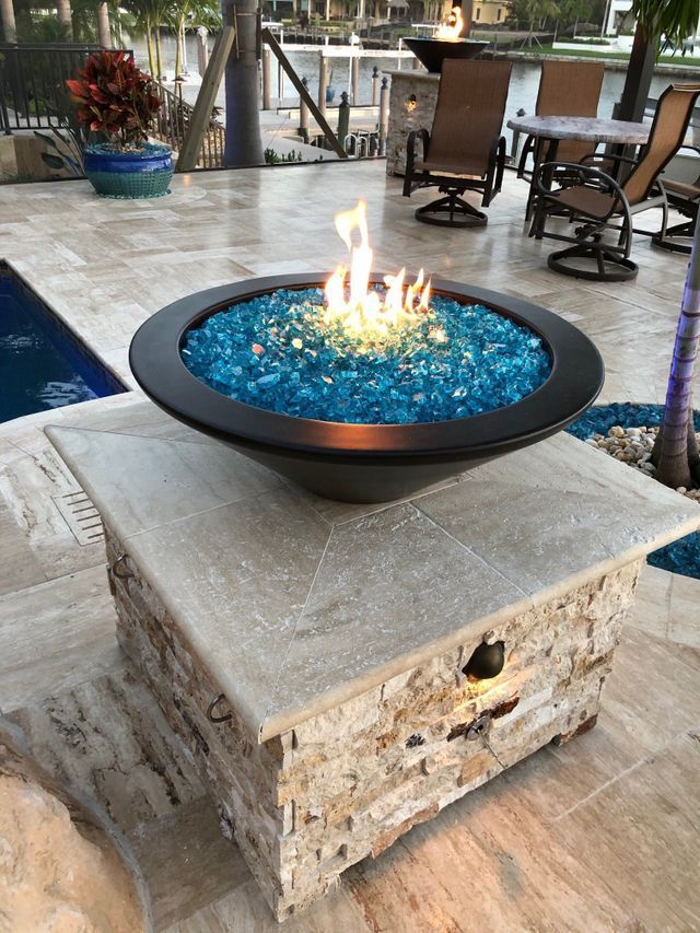 fire by design fire bowl in custom column with speakers and lighting built in cape coral, fl