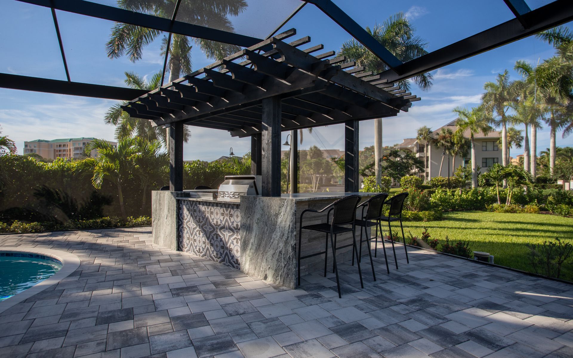 Wood Pergola covering outdoor kitchen, Naples FL