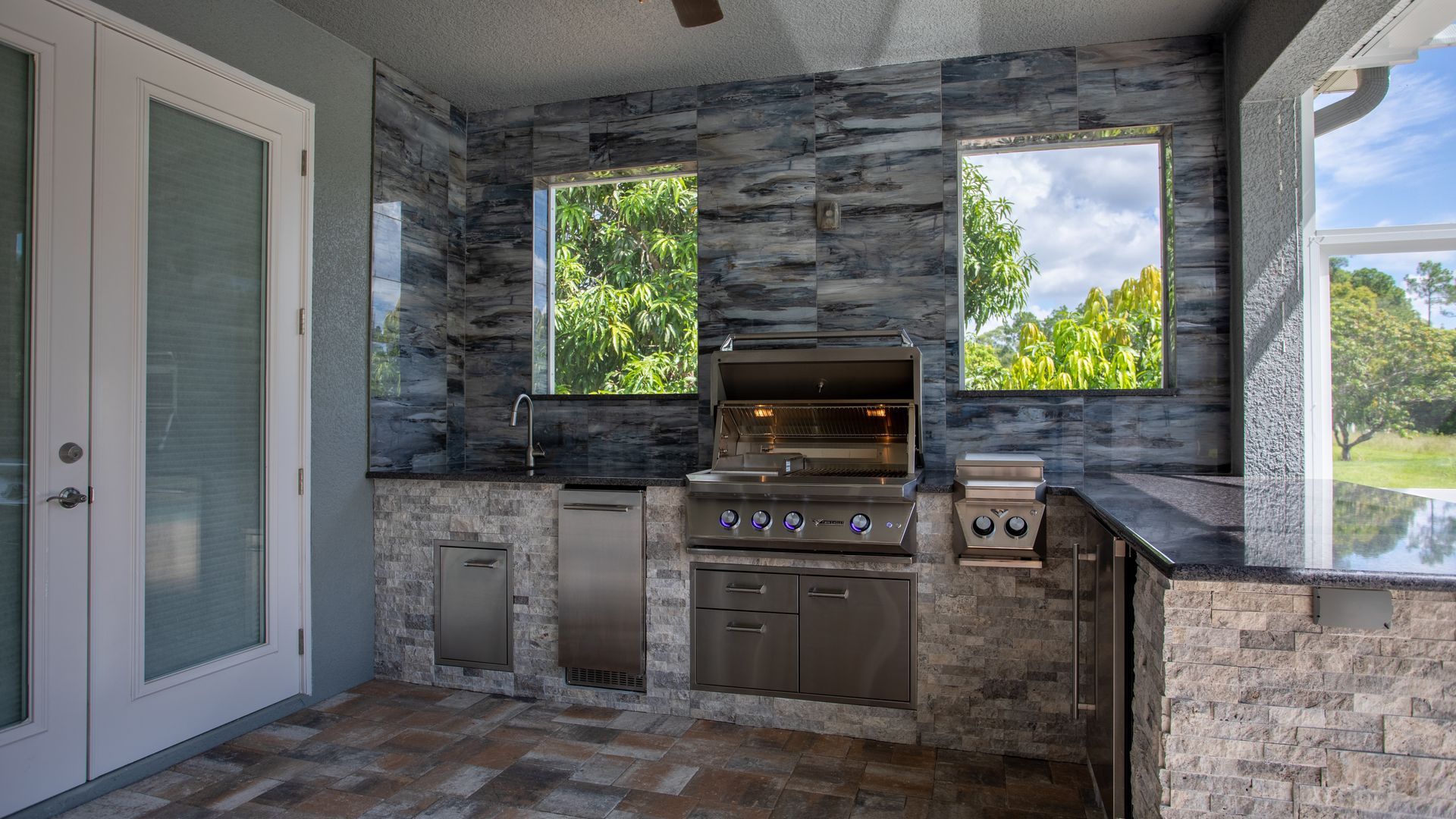 Big L Shape Outdoor Kitchen, Stacked Stone, hood, Naples FL