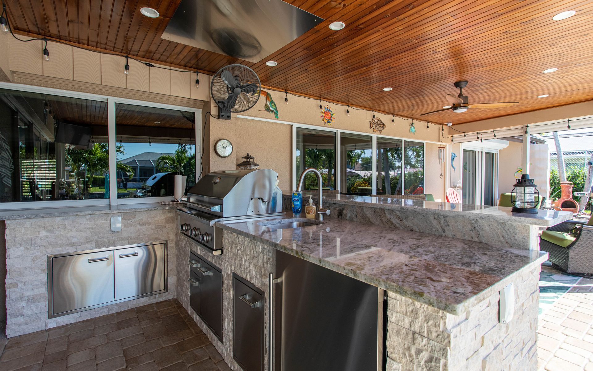 L Shape Outdoor Kitchen, Granite backsplash, hood, Fort Myers FL