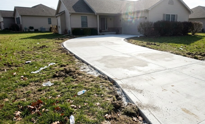 A freshly poured, durable concrete driveway leading to a beautiful home in Pasco WA.