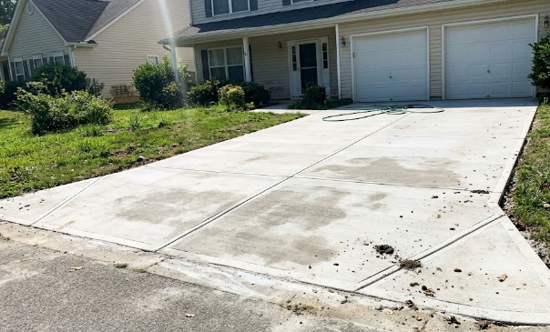 Freshly poured concrete driveway by a reliable contractor in Richland WA.
