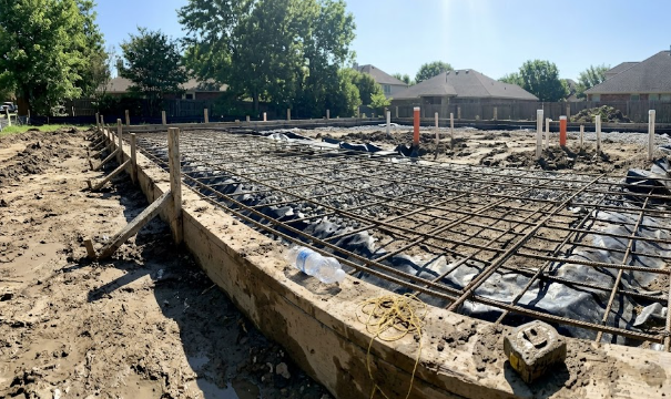 A strong and level concrete foundation slab prepared for a new home construction project in Spokane County.