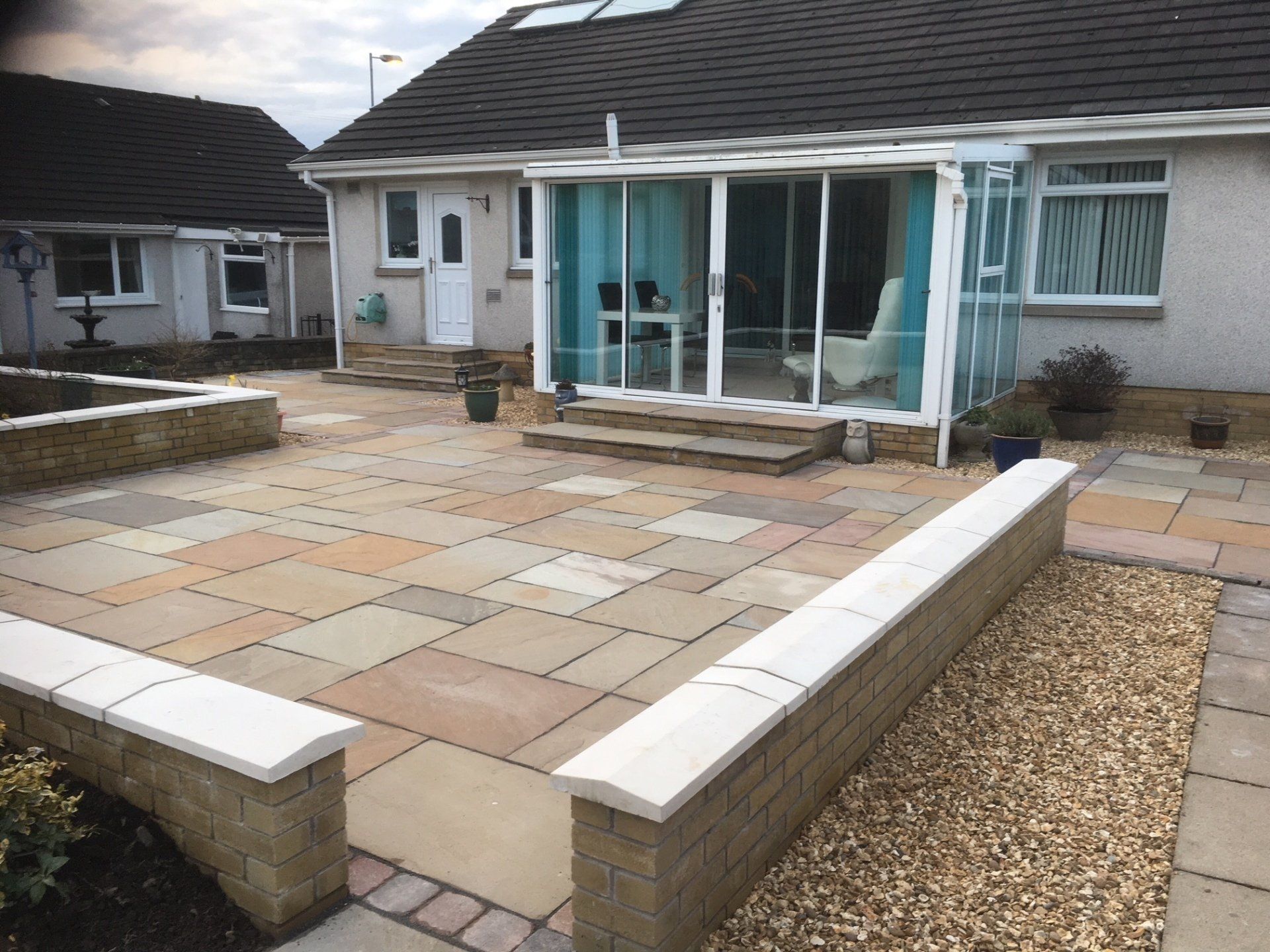 Large patio and conservatory on bungalow