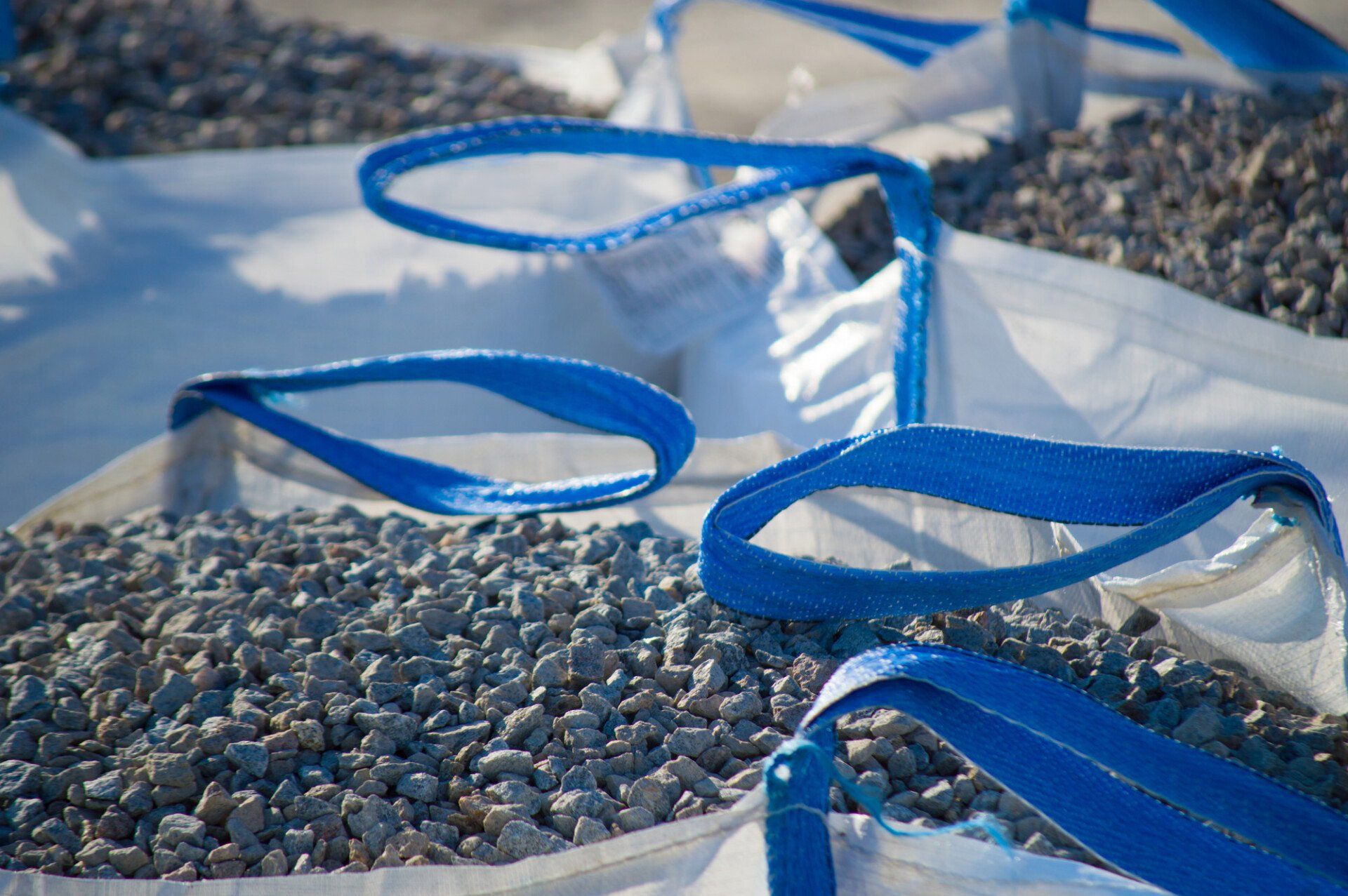 Bags of grey gravel at a garden centre