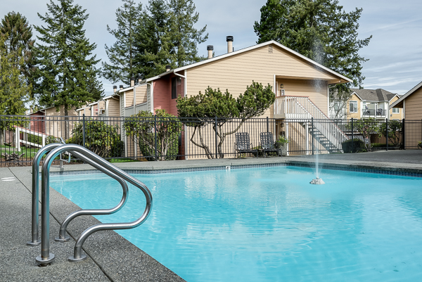 Photo of the community pool, showing a ladder to the pool