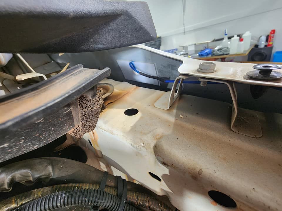 A Close Up of a Piece of Metal on a Car — Ace Tinting in Mareeba, QLD