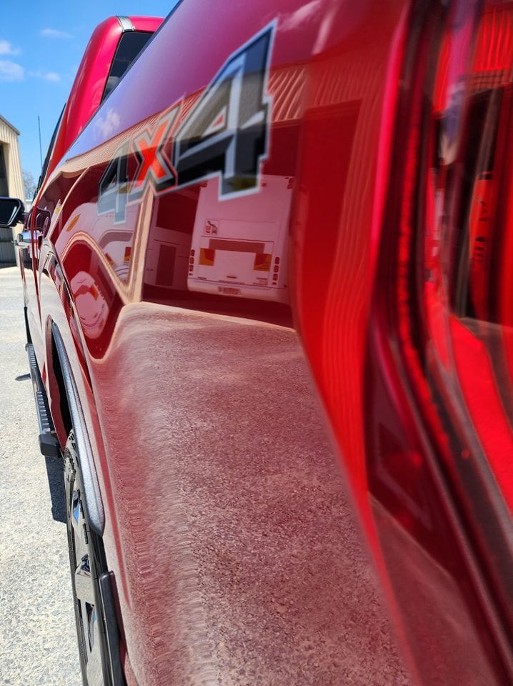 A red truck with the number 4 on the side — Ace Tinting in Mareeba, QLD