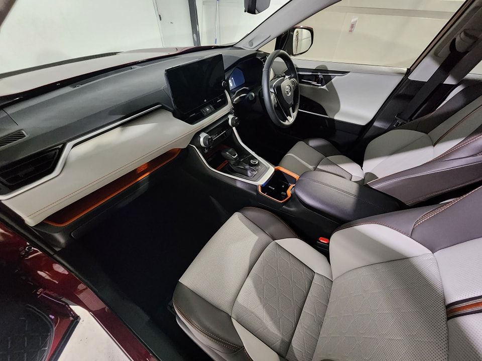 The interior of a car with a steering wheel and dashboard — Ace Tinting in Mareeba, QLD