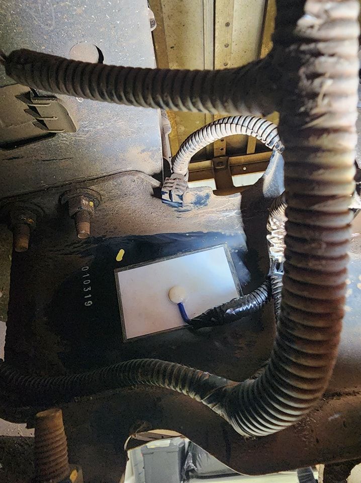 A close up of a hose on the side of a vehicle — Ace Tinting in Mareeba, QLD
