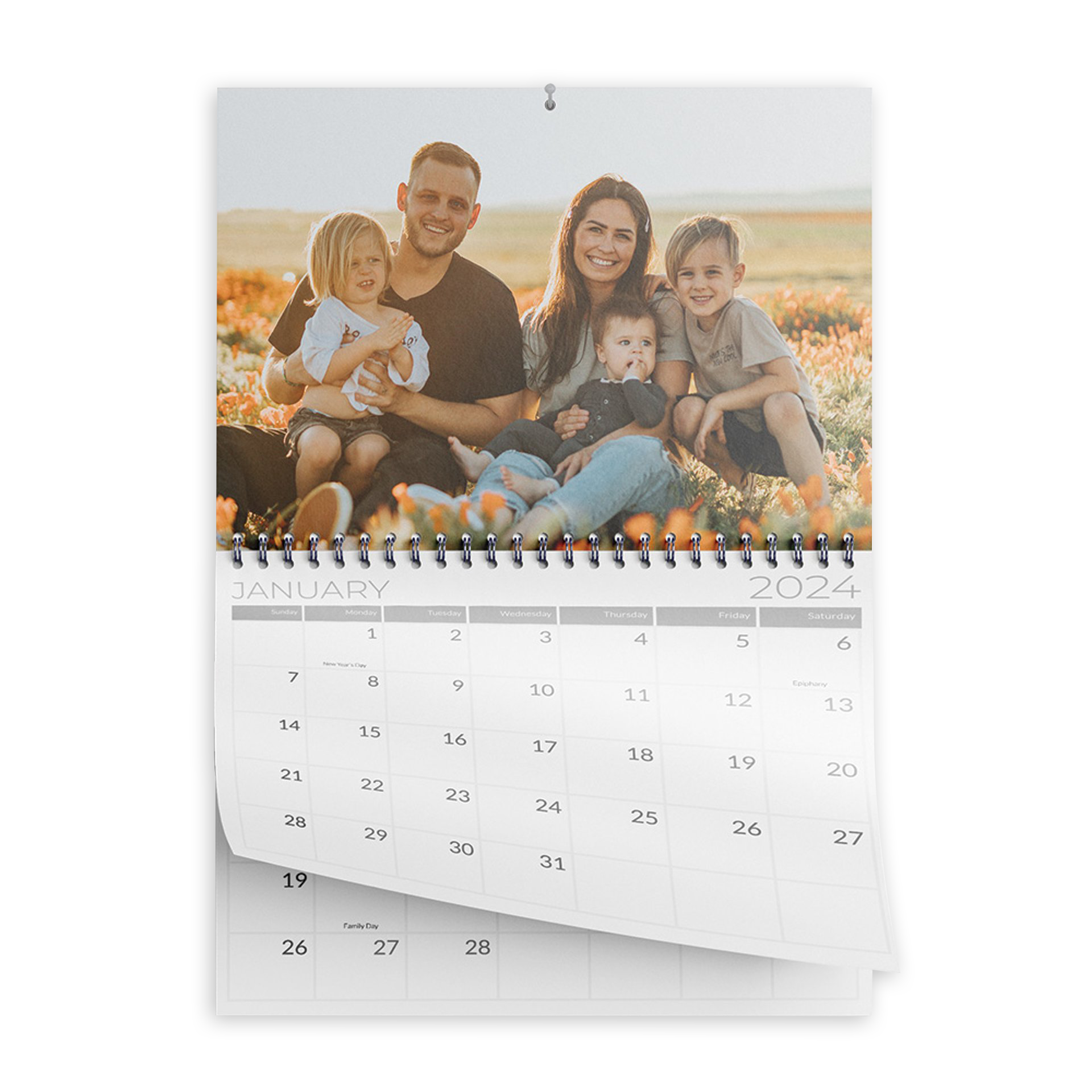 a calendar with a picture of a family on it .