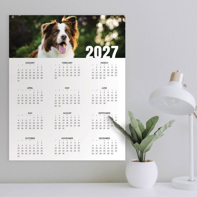 a calendar with a picture of a man and woman on it .