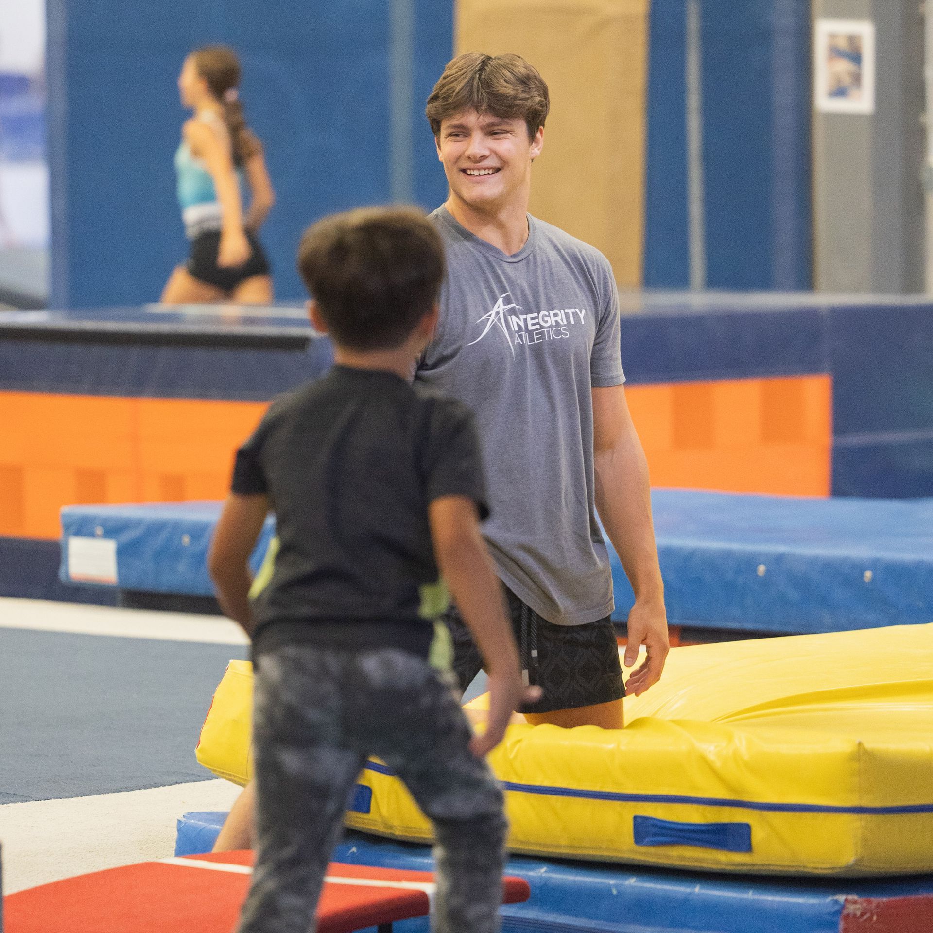 Child playing on gym equipment