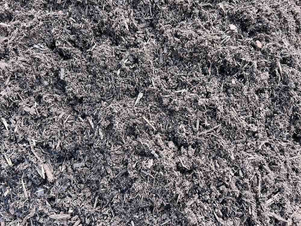 A Pile Of Compost With A Lot Of Small Pieces Of Wood In It — Cooroy Landscape Supplies and Garden Centre in Eumundi, QLD