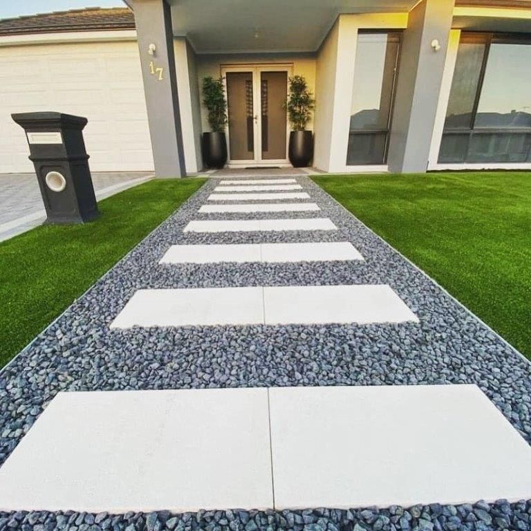 A Walkway Leading to The Front Door of A House — Cooroy Landscape Supplies and Garden Centre in Cooroy, QLD