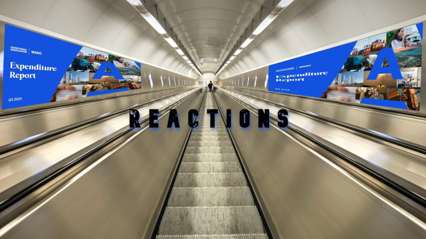 Empty escalator corridor with blue airport ads and the word “REACTIONS” across the center