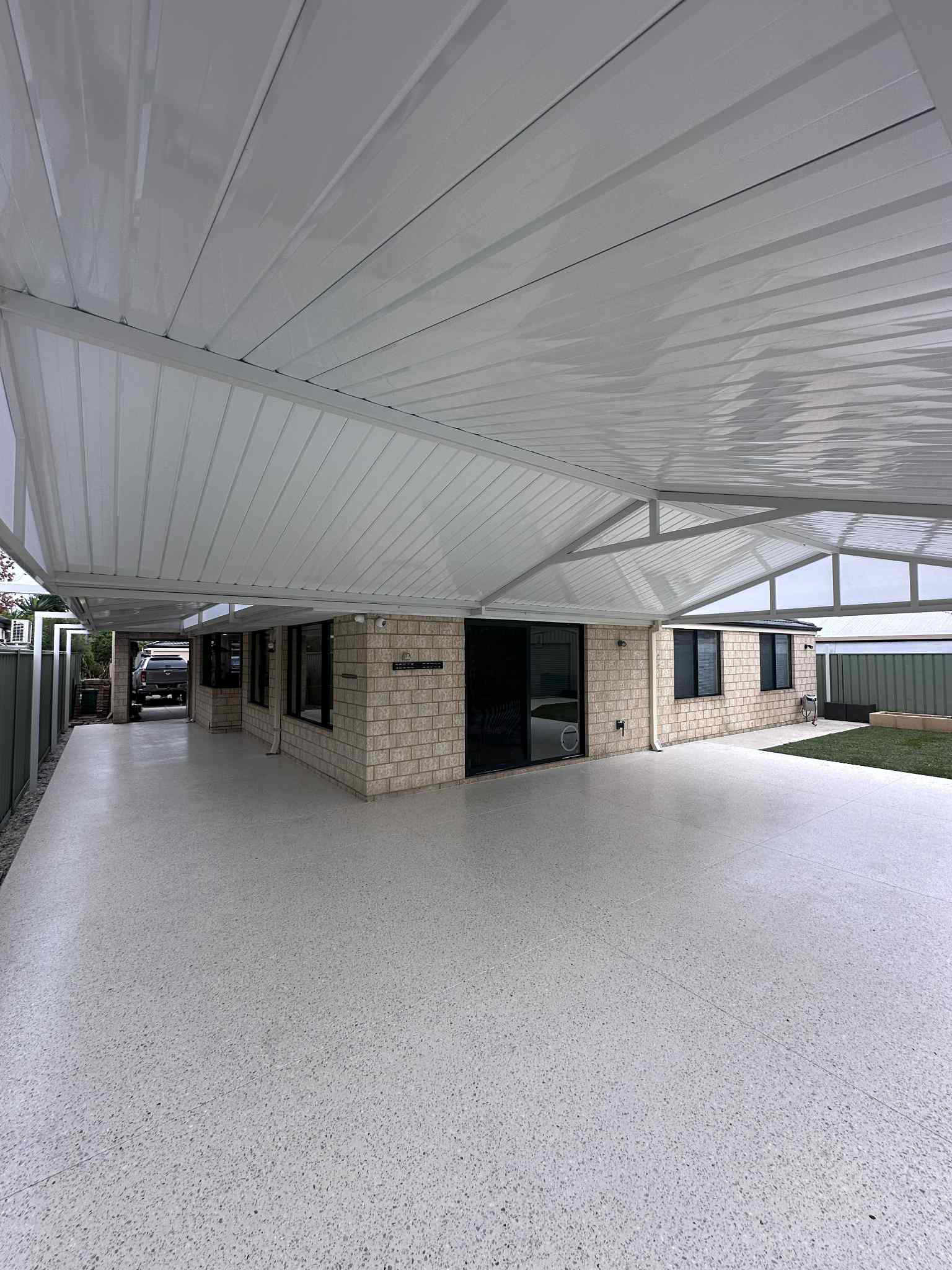 Honed concrete patio in Perth sealed for UV protection.