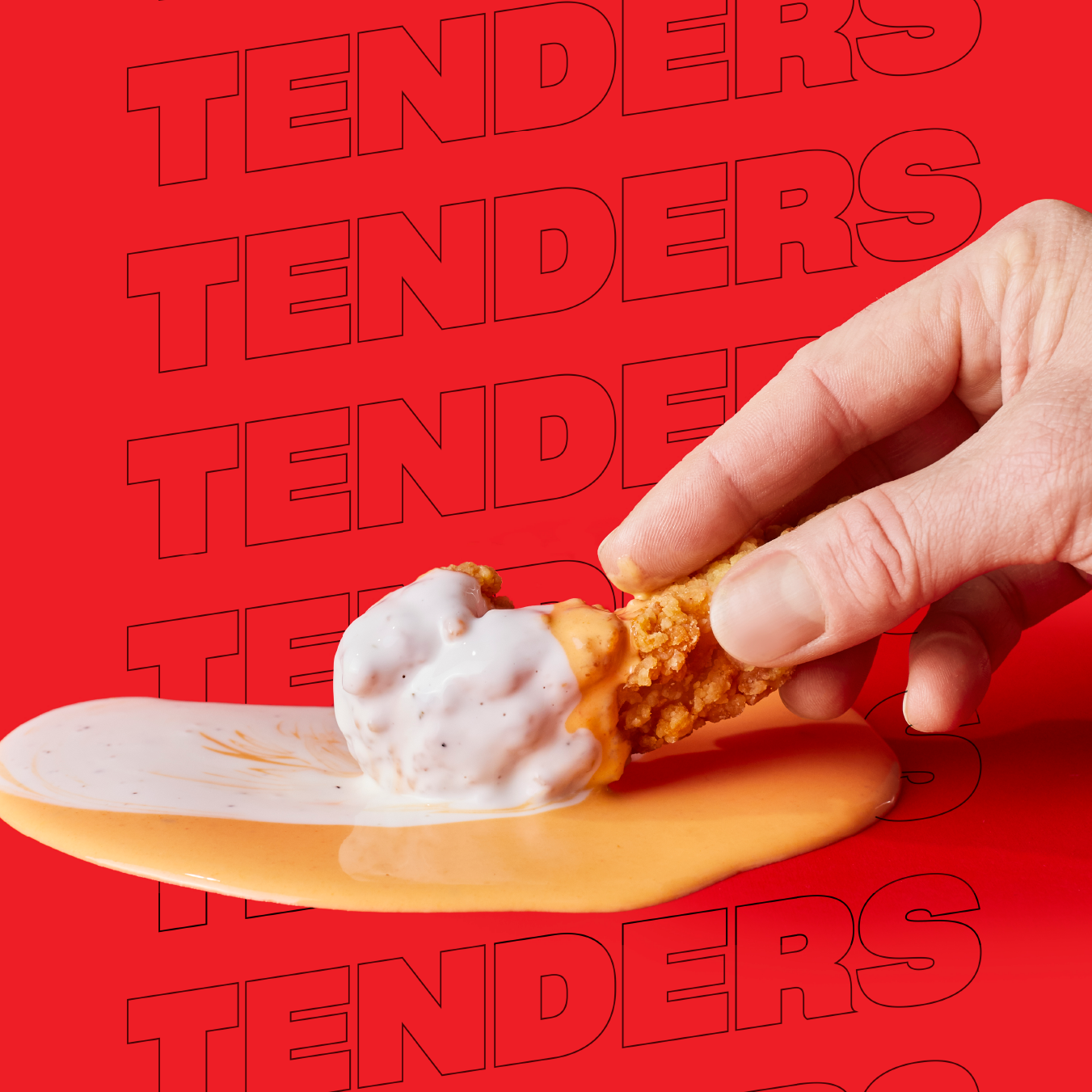 A hand is holding a fried chicken cone with sauce on it ..